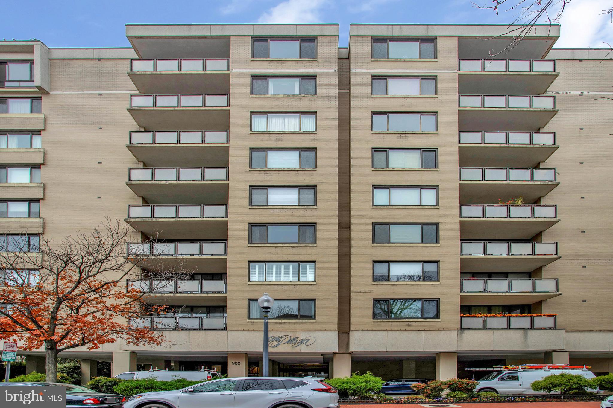 a front view of a building with a lot of windows