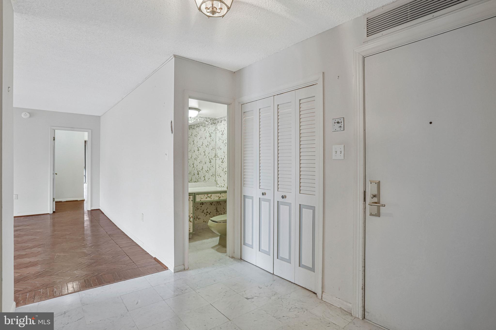 800 25th Street Northwest, Unit 502 Washington, DC 20037 - Photo 17 of 48 wooden floor with white walls