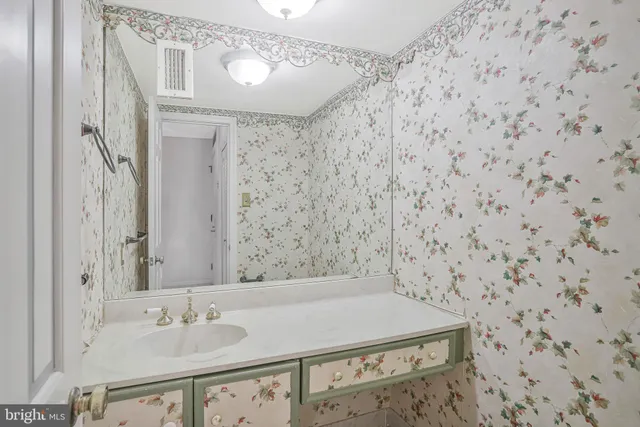 a view of a livingroom with wooden floor