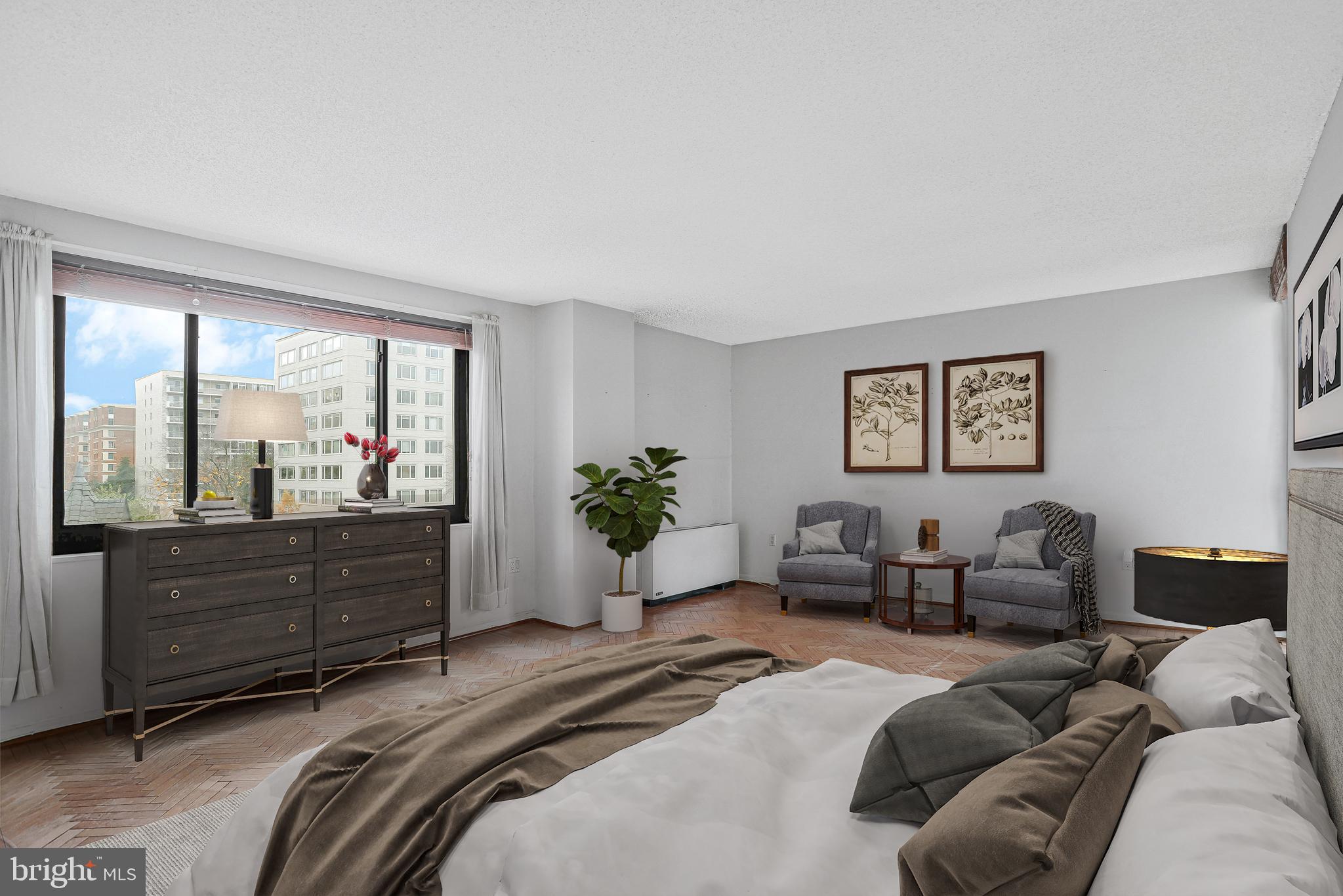 800 25th Street Northwest, Unit 502 Washington, DC 20037 - Photo 24 of 48 a bed room with a bed mirror and window