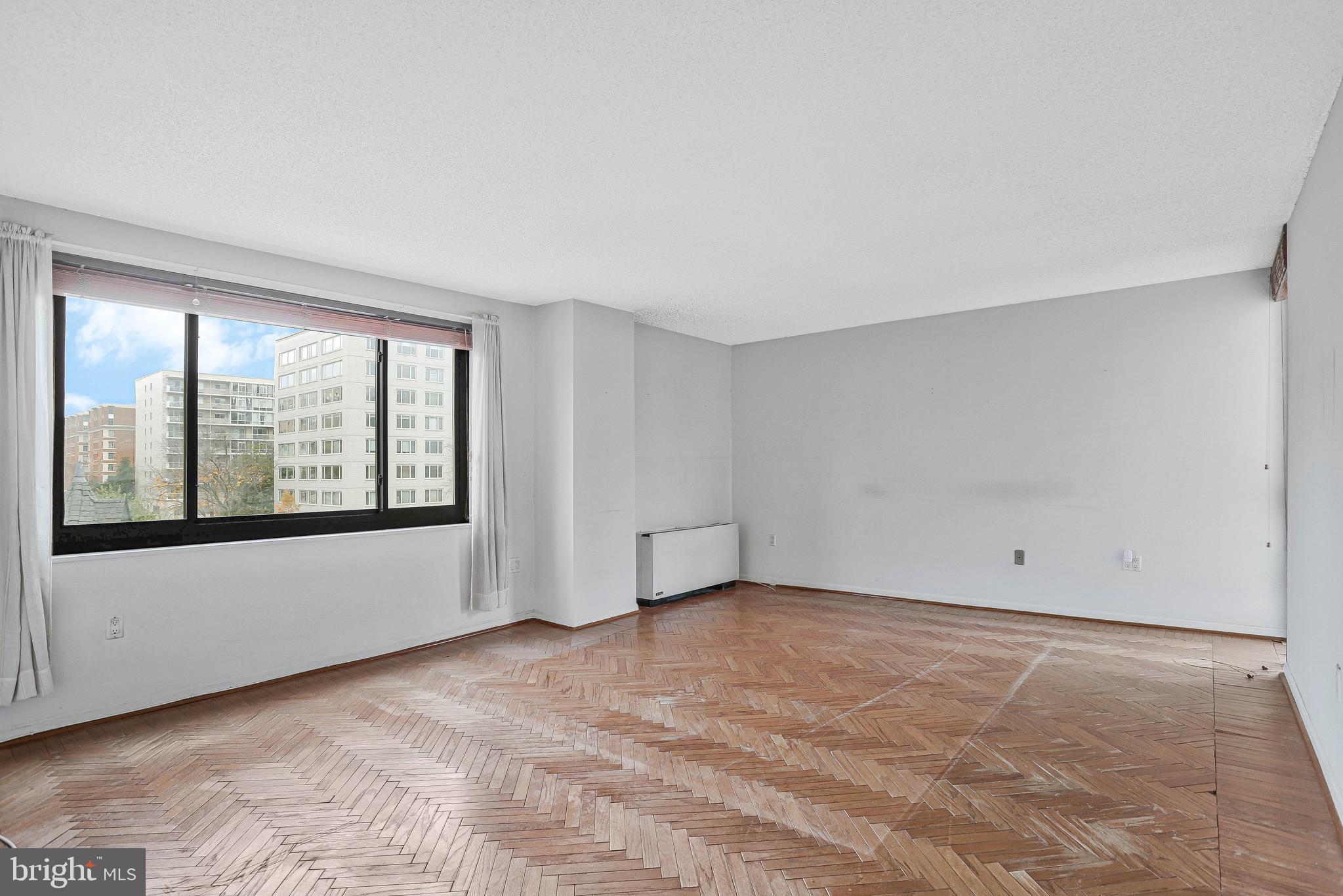 800 25th Street Northwest, Unit 502 Washington, DC 20037 - Photo 25 of 48 a view of an empty room with a window