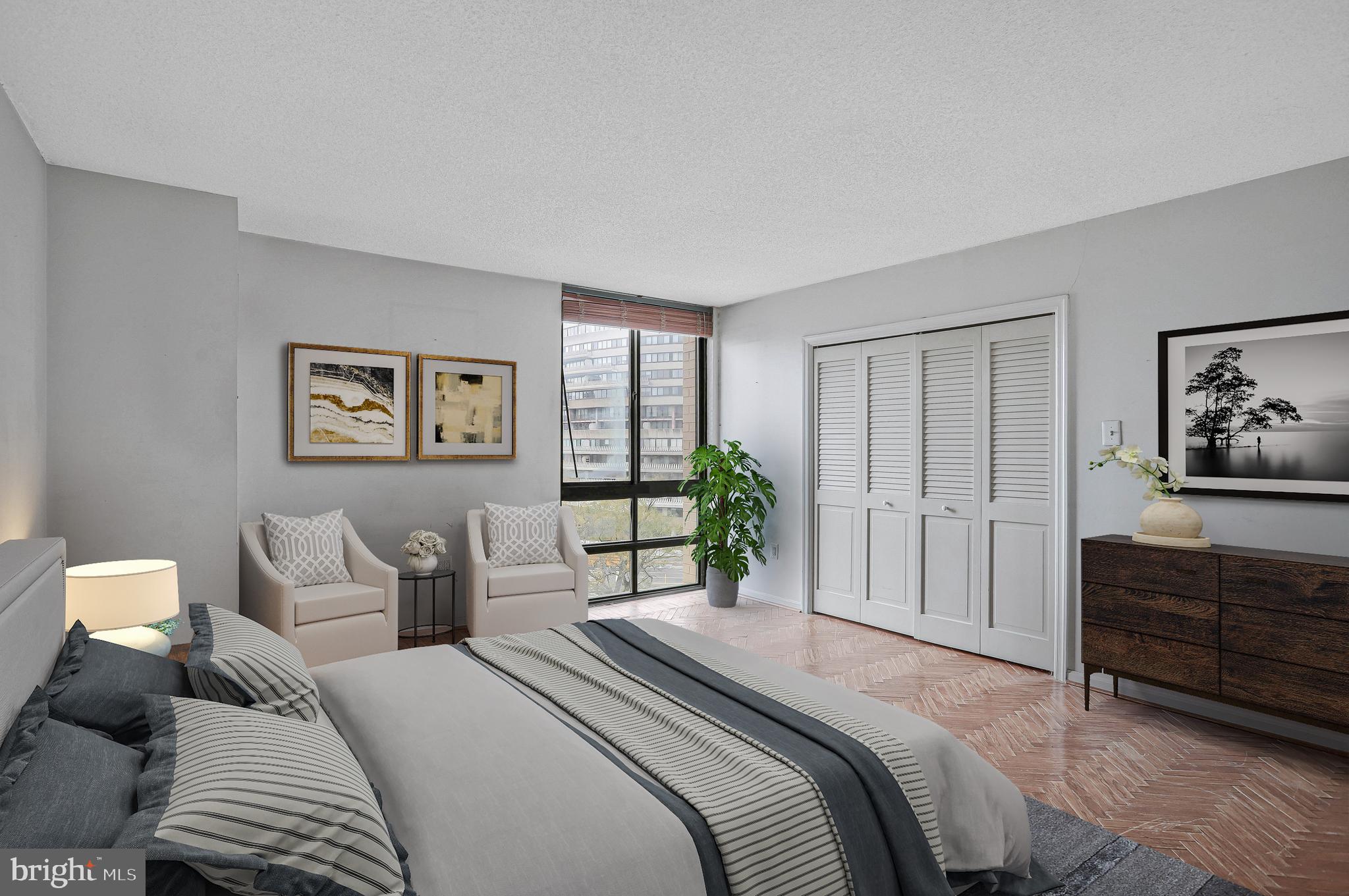 800 25th Street Northwest, Unit 502 Washington, DC 20037 - Photo 31 of 48 a bedroom with a bed and a dresser