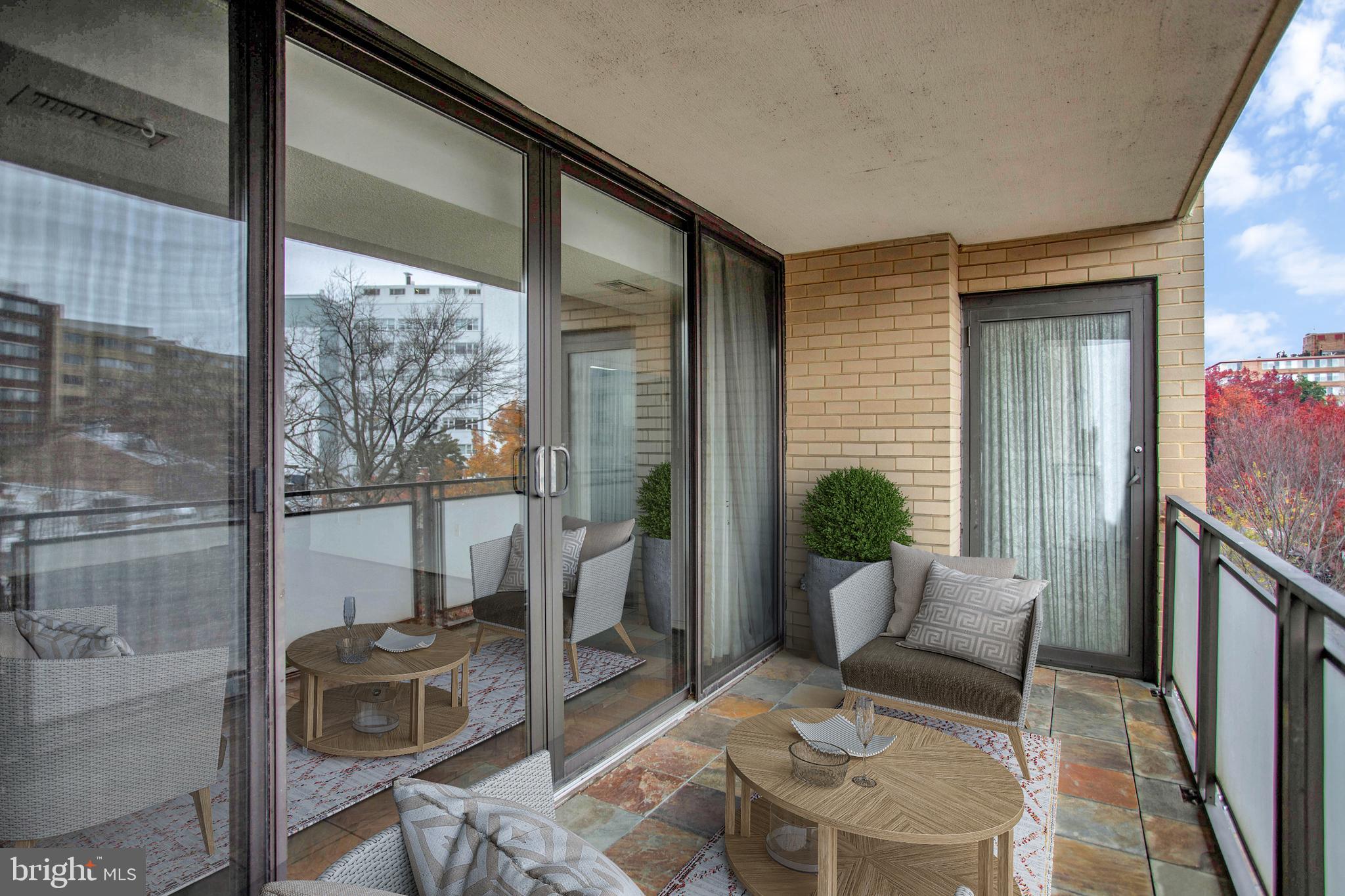 800 25th Street Northwest, Unit 502 Washington, DC 20037 - Photo 36 of 48 a balcony with furniture and a potted plant