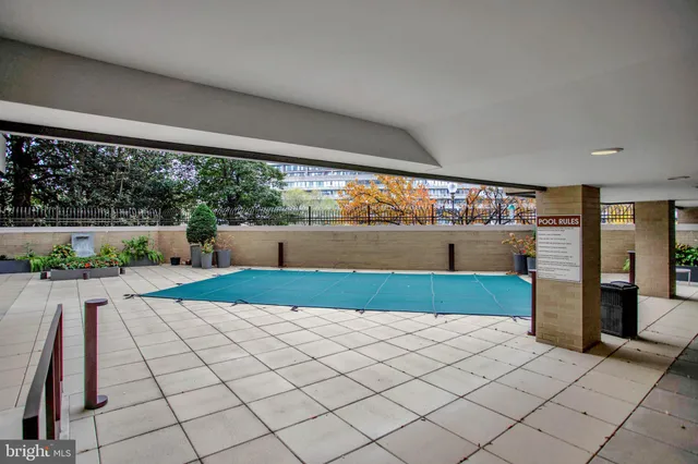 a view of parking garage with cars