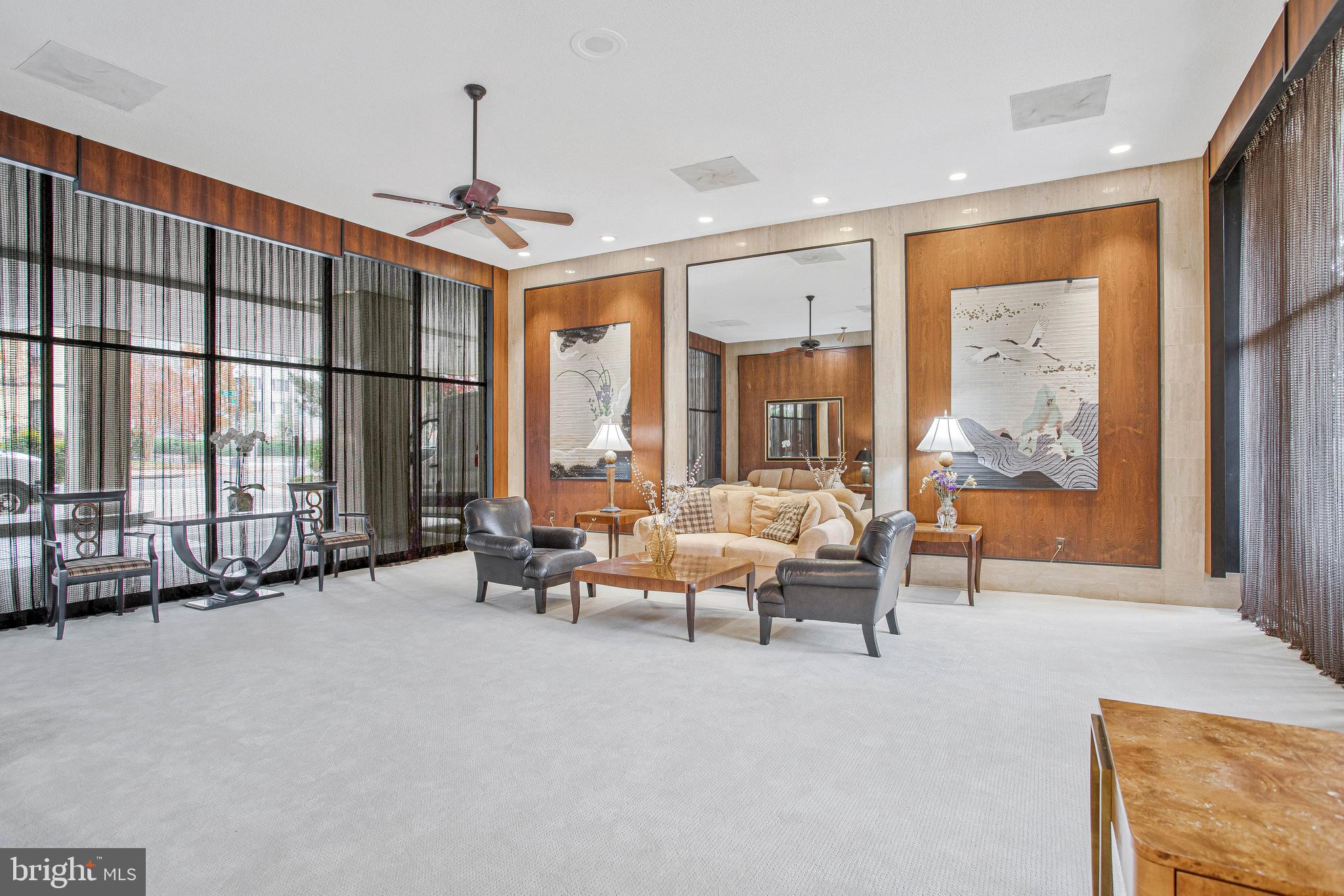 800 25th Street Northwest, Unit 502 Washington, DC 20037 - Photo 44 of 48 a living room with furniture windows and a chandelier