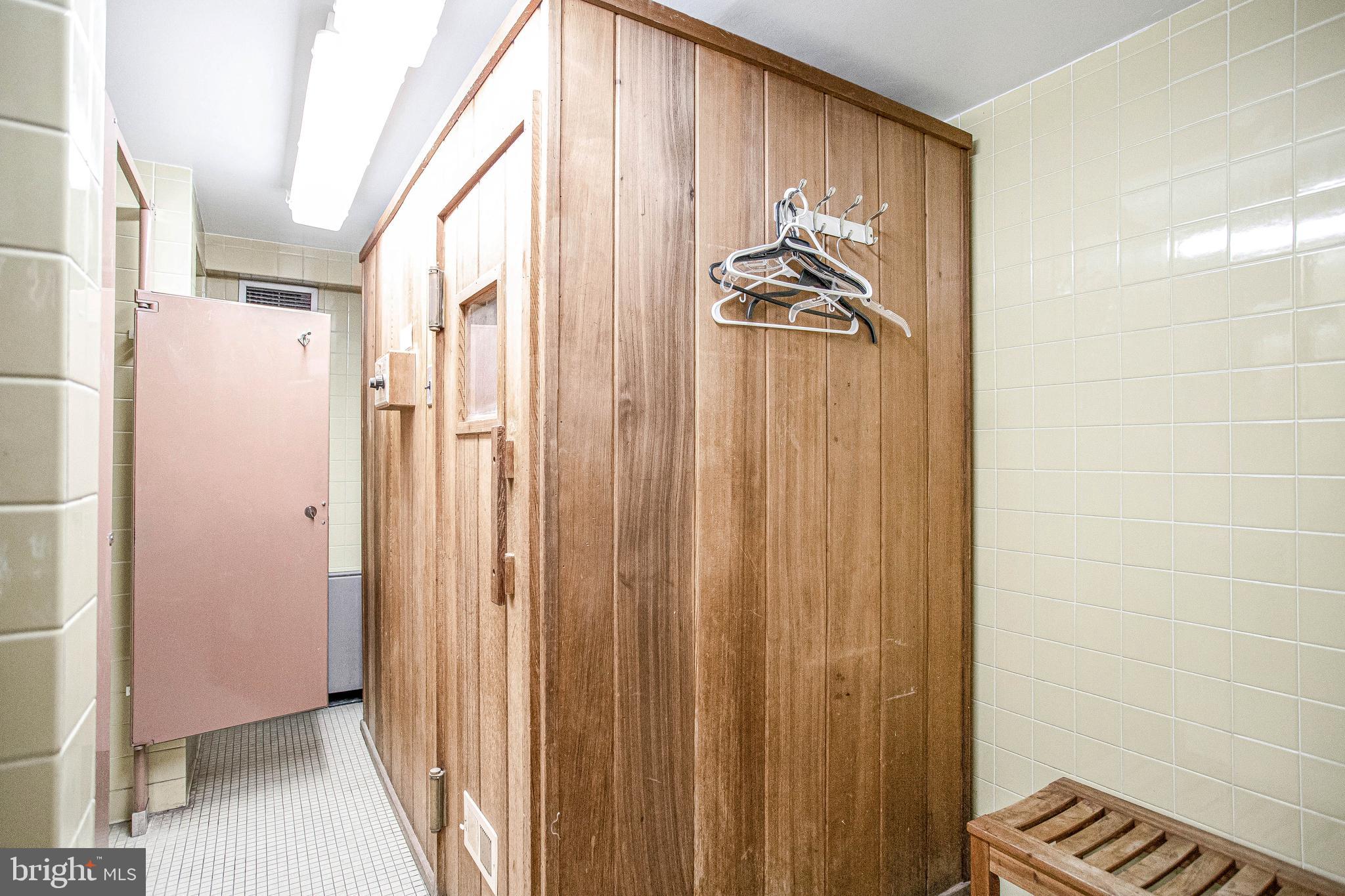 800 25th Street Northwest, Unit 502 Washington, DC 20037 - Photo 48 of 48 a bathroom with a shower and a mirror