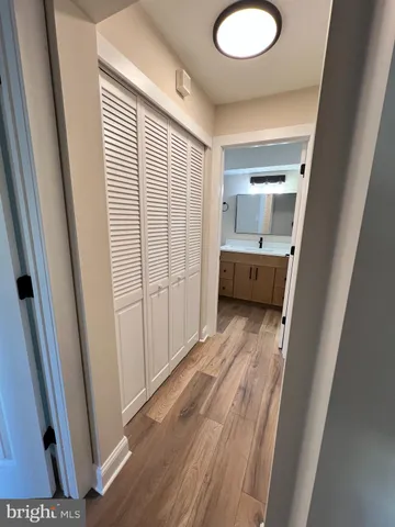a view of bathroom with sink and mirror