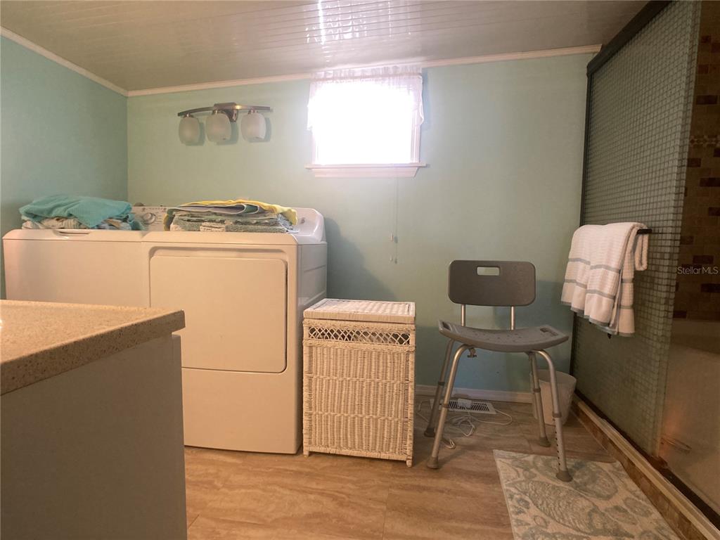 1710 7th Street Southwest, Unit 27 Ruskin, FL 33570 - Photo 15 of 26 a utility room with dryer and washer