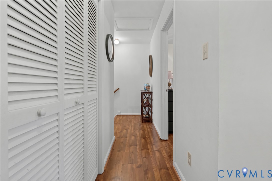 5010 Tatum Road Disputanta, VA 23842 - Photo 37 of 50 Hardwood flooring, painted white walls, white louv