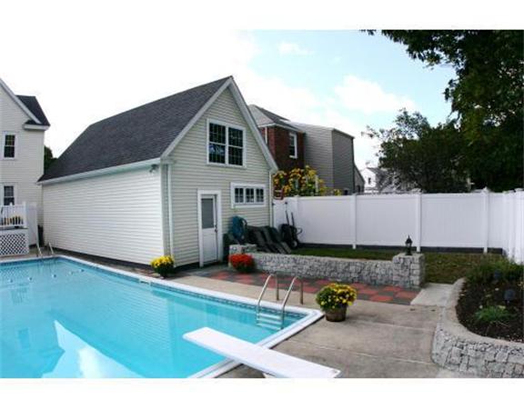 25 Barnes Street Waltham, MA 02453 - Photo 11 of 12 a view of a house with backyard sitting area and garden