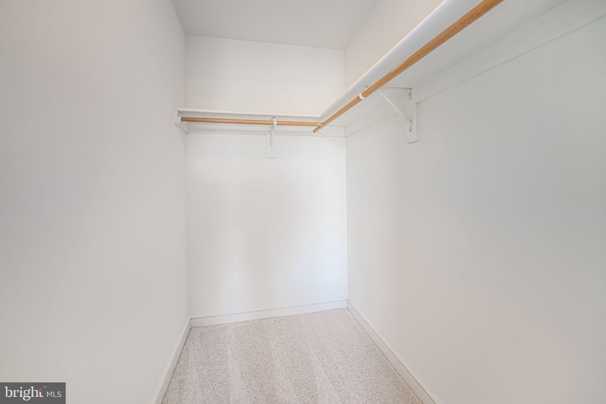 11990 Market Street, Unit 413 Reston, VA 20190 - Photo 28 of 82 a view of an empty walk in closet