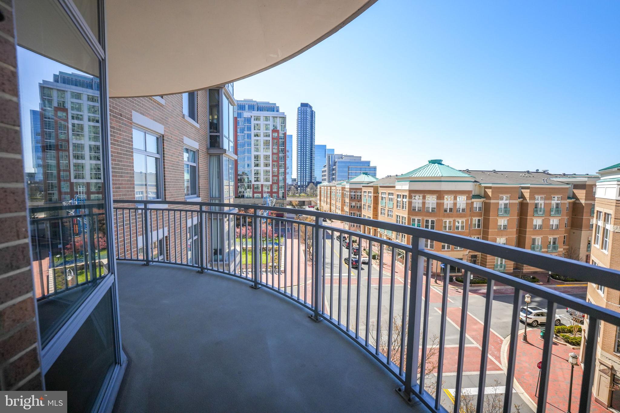 11990 Market Street, Unit 413 Reston, VA 20190 - Photo 34 of 82 a view of city from a balcony