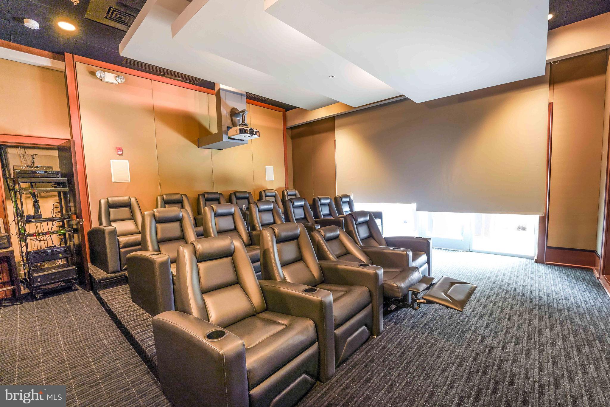 11990 Market Street, Unit 413 Reston, VA 20190 - Photo 51 of 82 a living room with couches and a coffee table with wooden floor