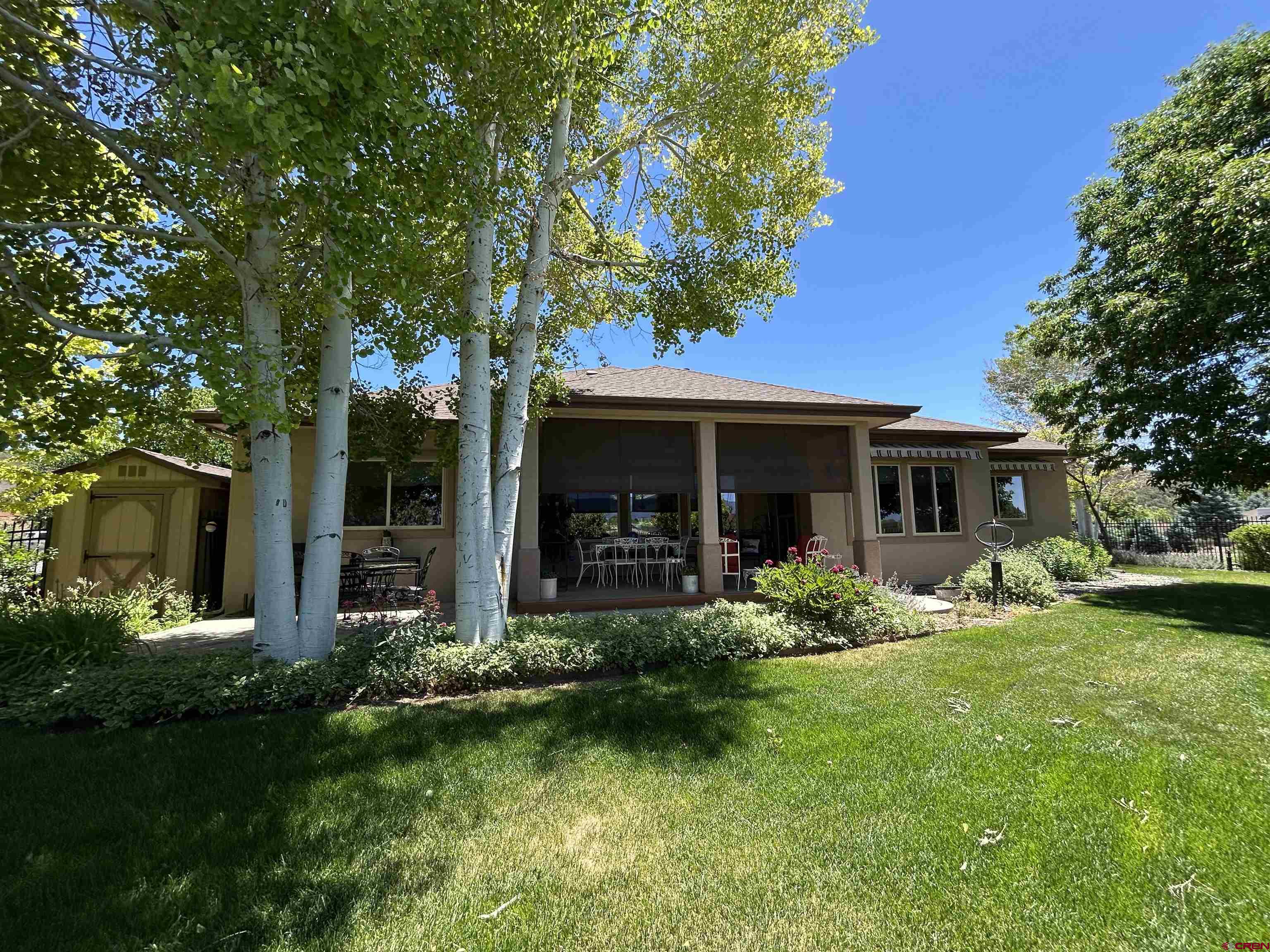 850 Southeast Pinyon Street Cedaredge, CO 81413 - Photo 36 of 45 a front view of a house with garden