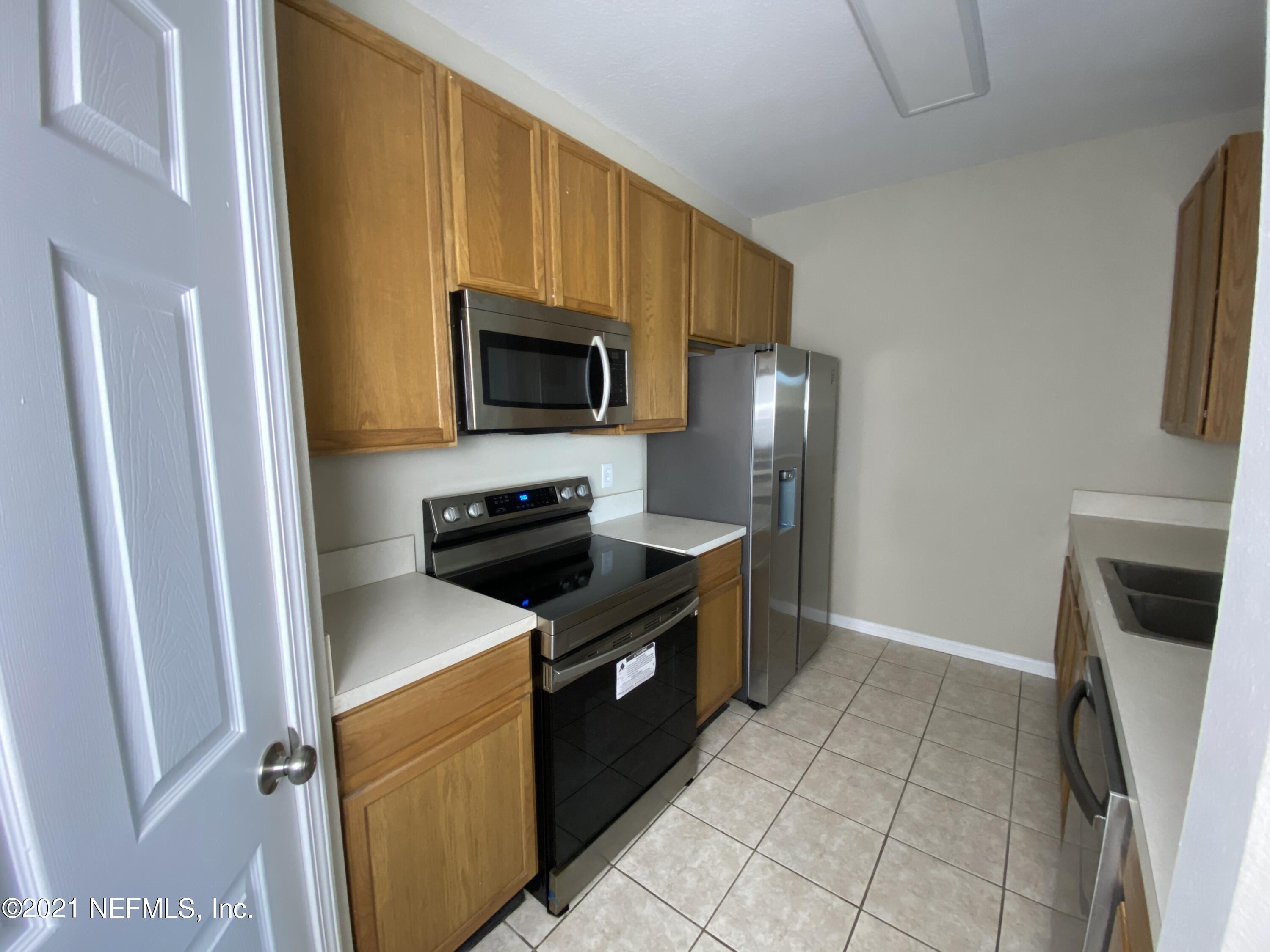 10550 Baymeadows Road, Unit 909 Jacksonville, FL 32256 - Photo 3 of 13 IMG-0543