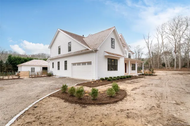 a view of a yard in front of a house