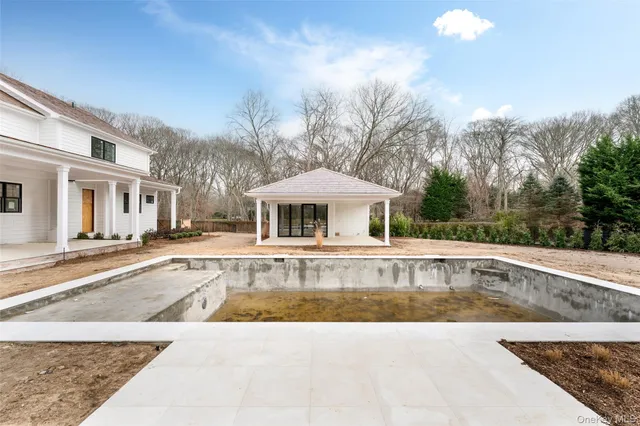 a front view of house with a yard