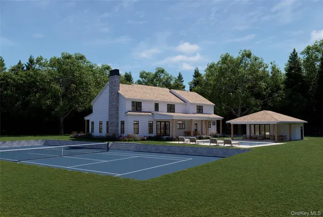 a front view of a house with a garden and trees