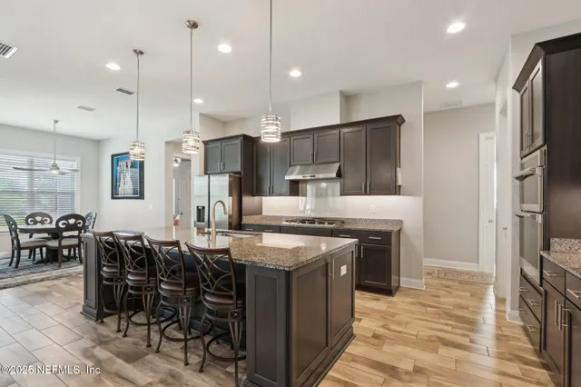 a view of chairs and tables in the patio