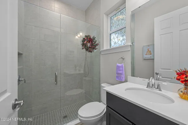 front view of a house with a potted plant