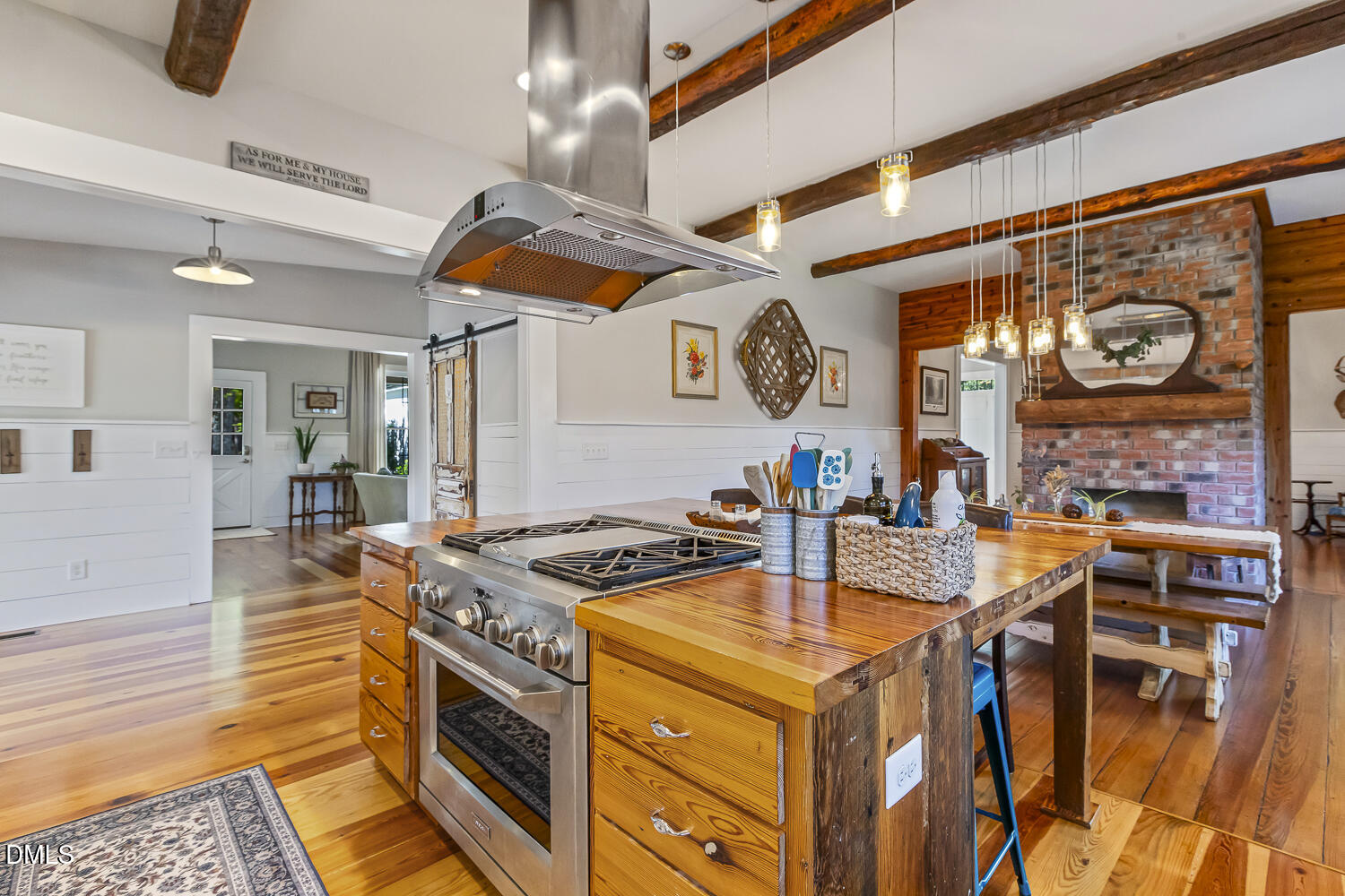 129 Kipling Road Fuquay-Varina, NC 27526 - Photo 13 of 58 a kitchen with stainless steel appliances granite countertop a stove and a sink