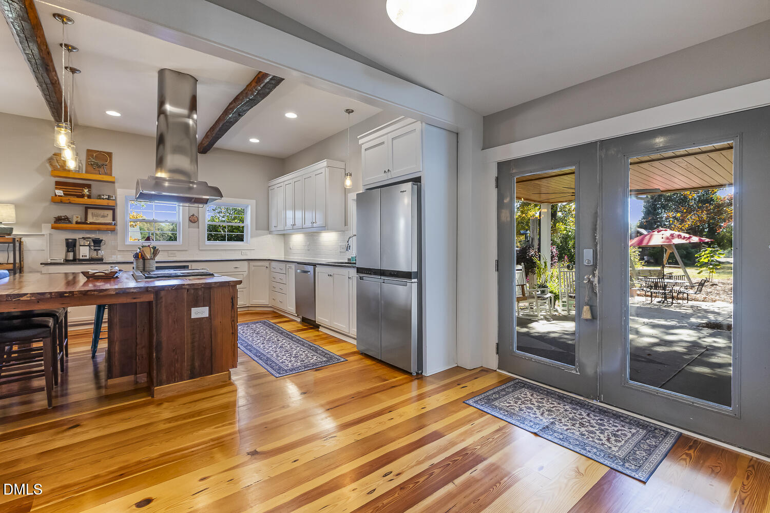 129 Kipling Road Fuquay-Varina, NC 27526 - Photo 20 of 58 a kitchen with stainless steel appliances granite countertop a refrigerator and a stove top oven