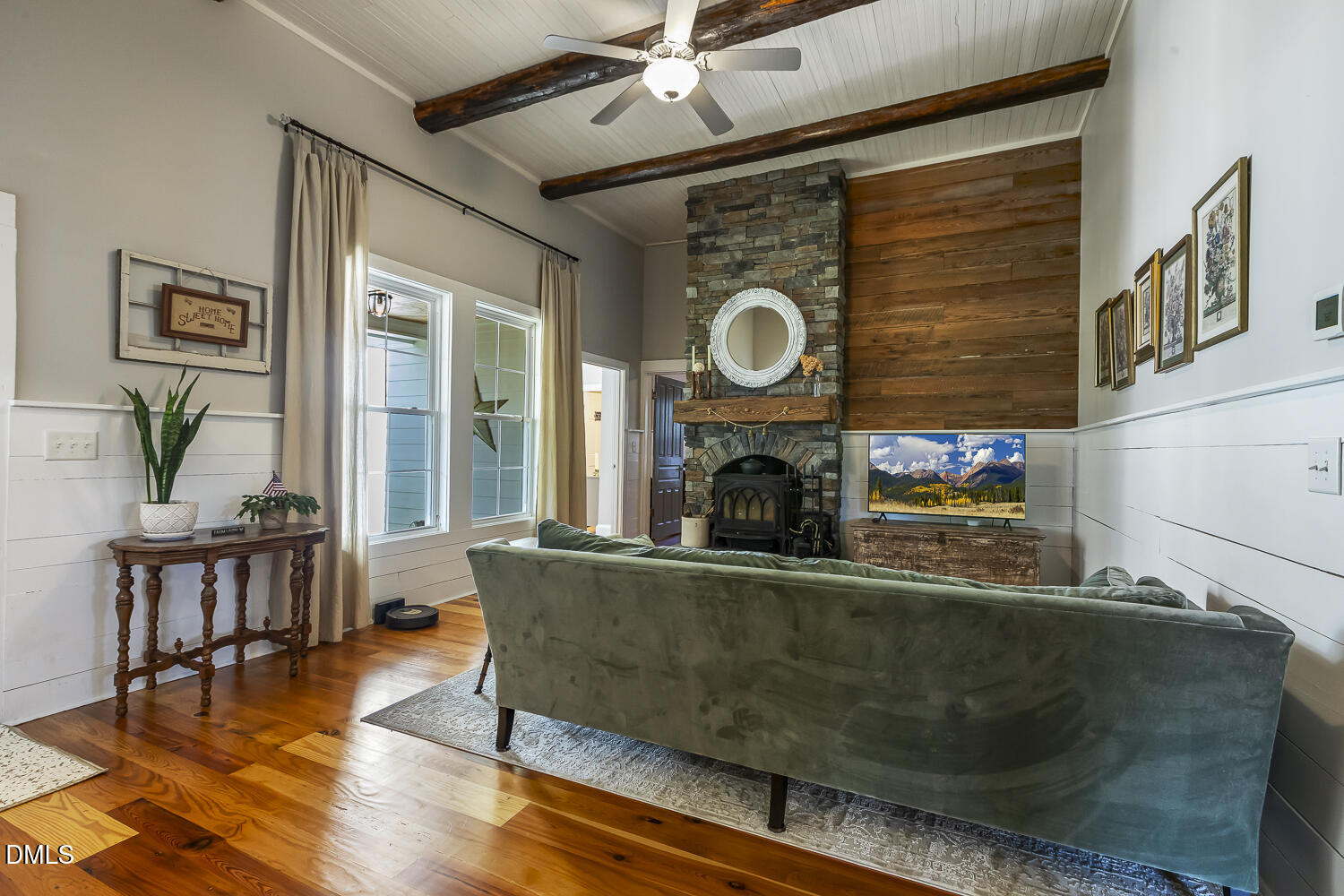 129 Kipling Road Fuquay-Varina, NC 27526 - Photo 21 of 58 a living room with furniture and a fireplace
