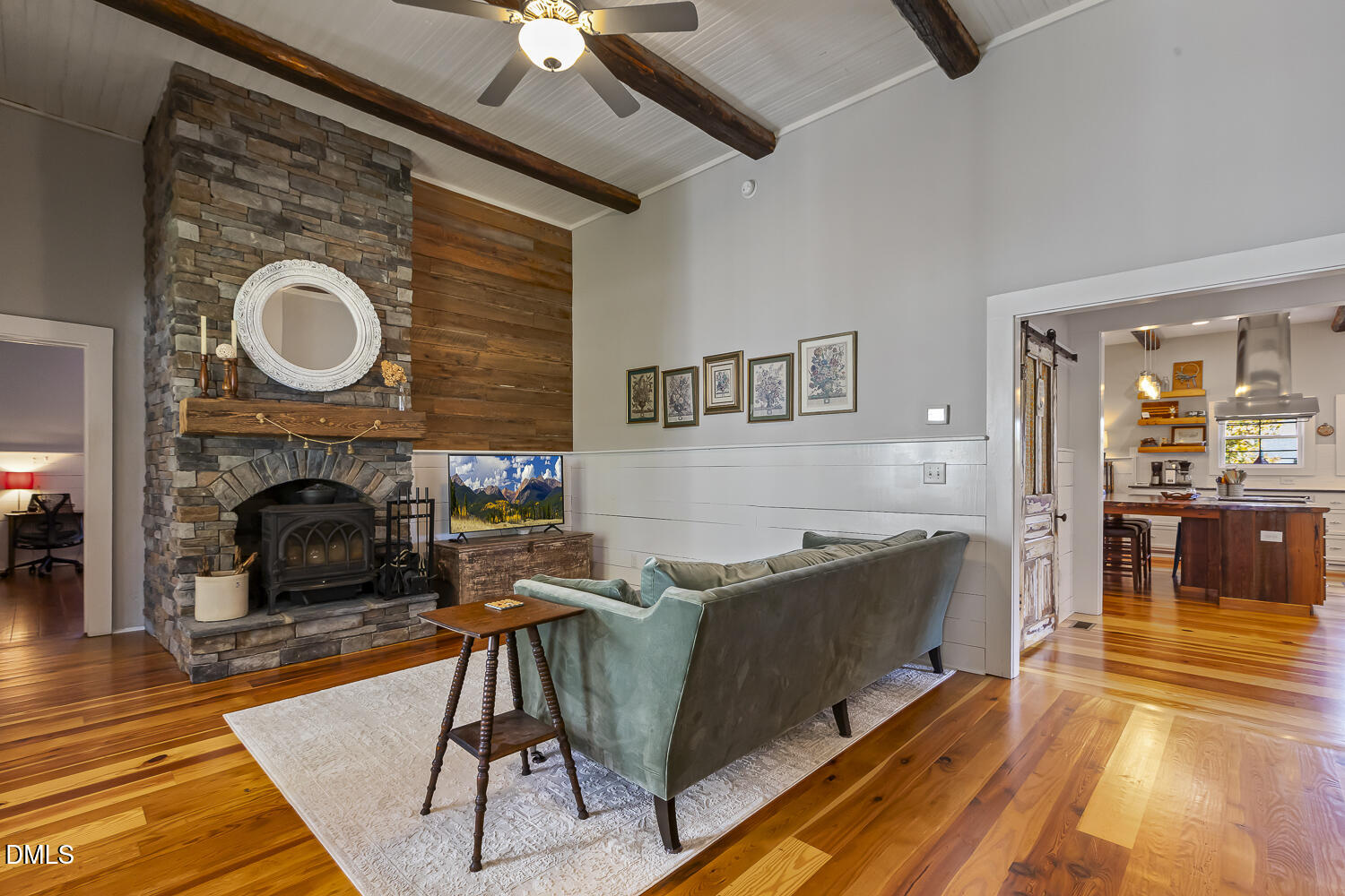 129 Kipling Road Fuquay-Varina, NC 27526 - Photo 22 of 58 a living room with furniture and a fireplace
