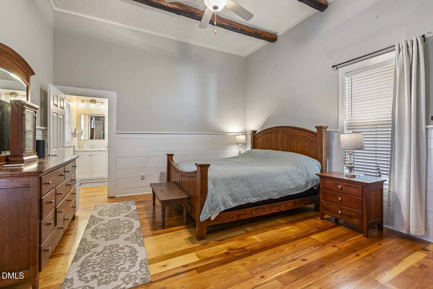 129 Kipling Road Fuquay-Varina, NC 27526 - Photo 25 of 58 a bedroom with a bed and flat screen tv