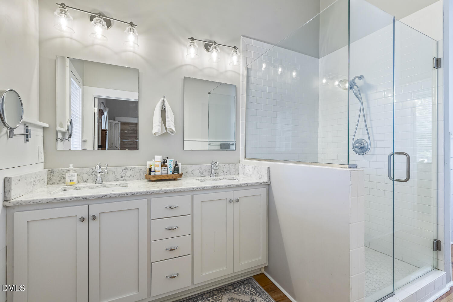 129 Kipling Road Fuquay-Varina, NC 27526 - Photo 27 of 58 a bathroom with a double vanity sink mirror and double