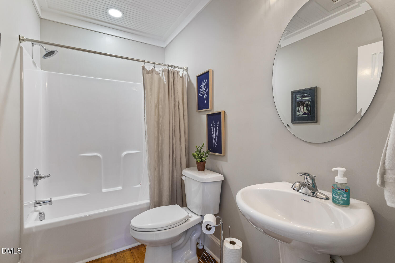 129 Kipling Road Fuquay-Varina, NC 27526 - Photo 31 of 58 a bathroom with a sink toilet and shower