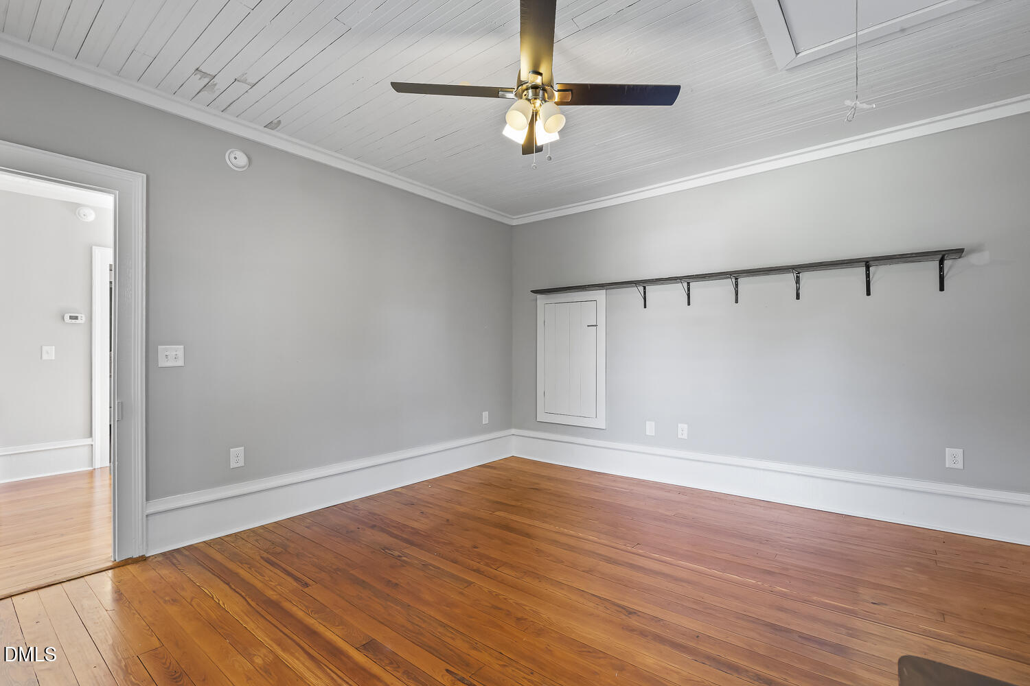 129 Kipling Road Fuquay-Varina, NC 27526 - Photo 38 of 58 a view of an empty room with wooden floor