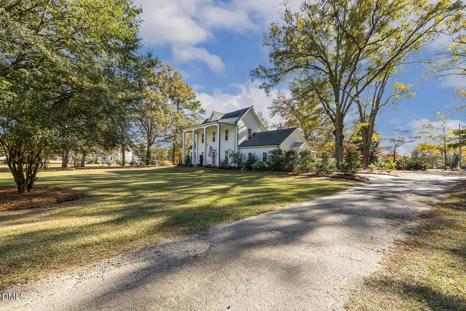 129 Kipling Road Fuquay-Varina, NC 27526 - Photo 4 of 58 a view of road with large trees