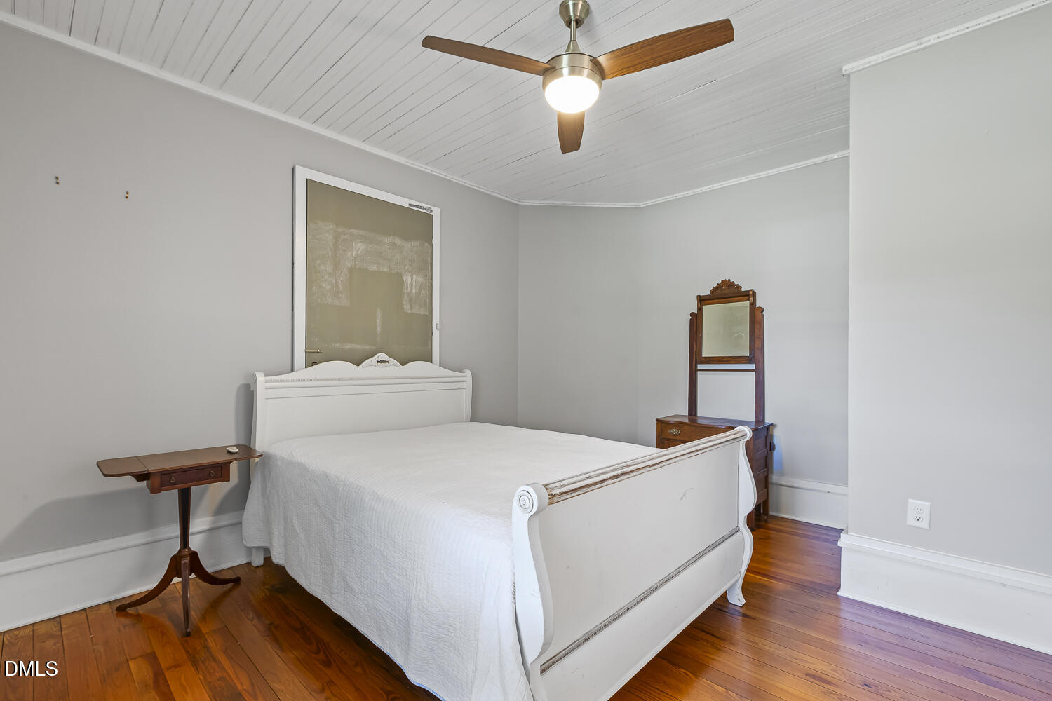 129 Kipling Road Fuquay-Varina, NC 27526 - Photo 41 of 58 a room with a sink and wooden floor