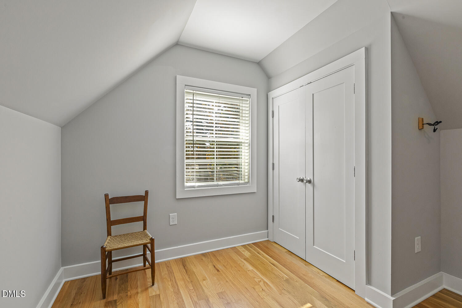 129 Kipling Road Fuquay-Varina, NC 27526 - Photo 43 of 58 a view of a livingroom with wooden floor and a window
