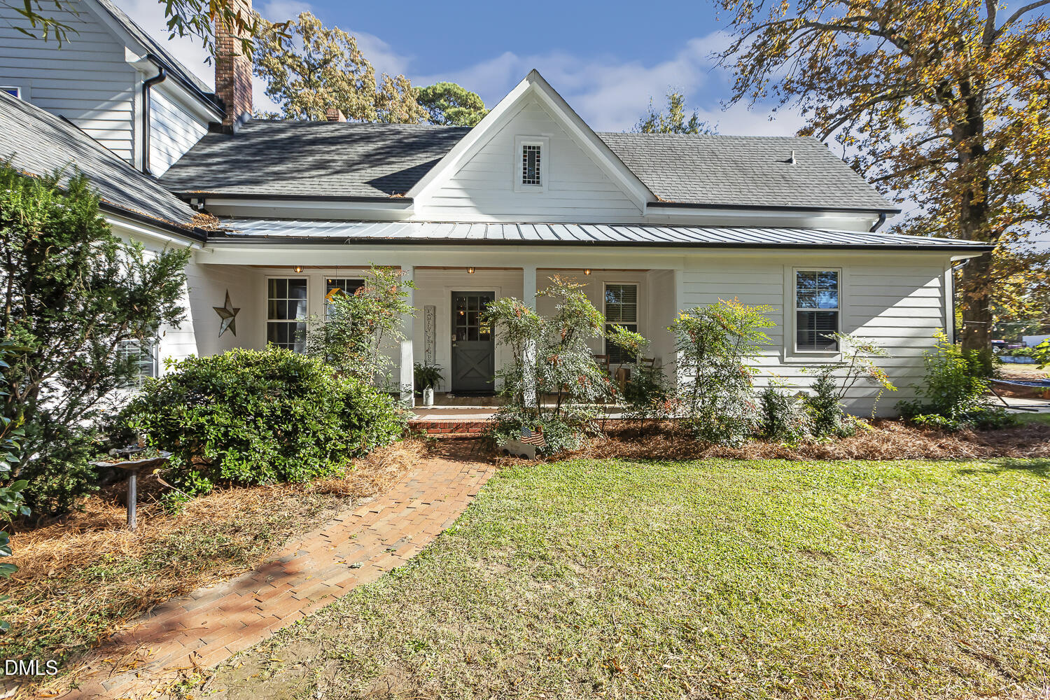 129 Kipling Road Fuquay-Varina, NC 27526 - Photo 49 of 58 front view of a house with yard outdoor seating and plants