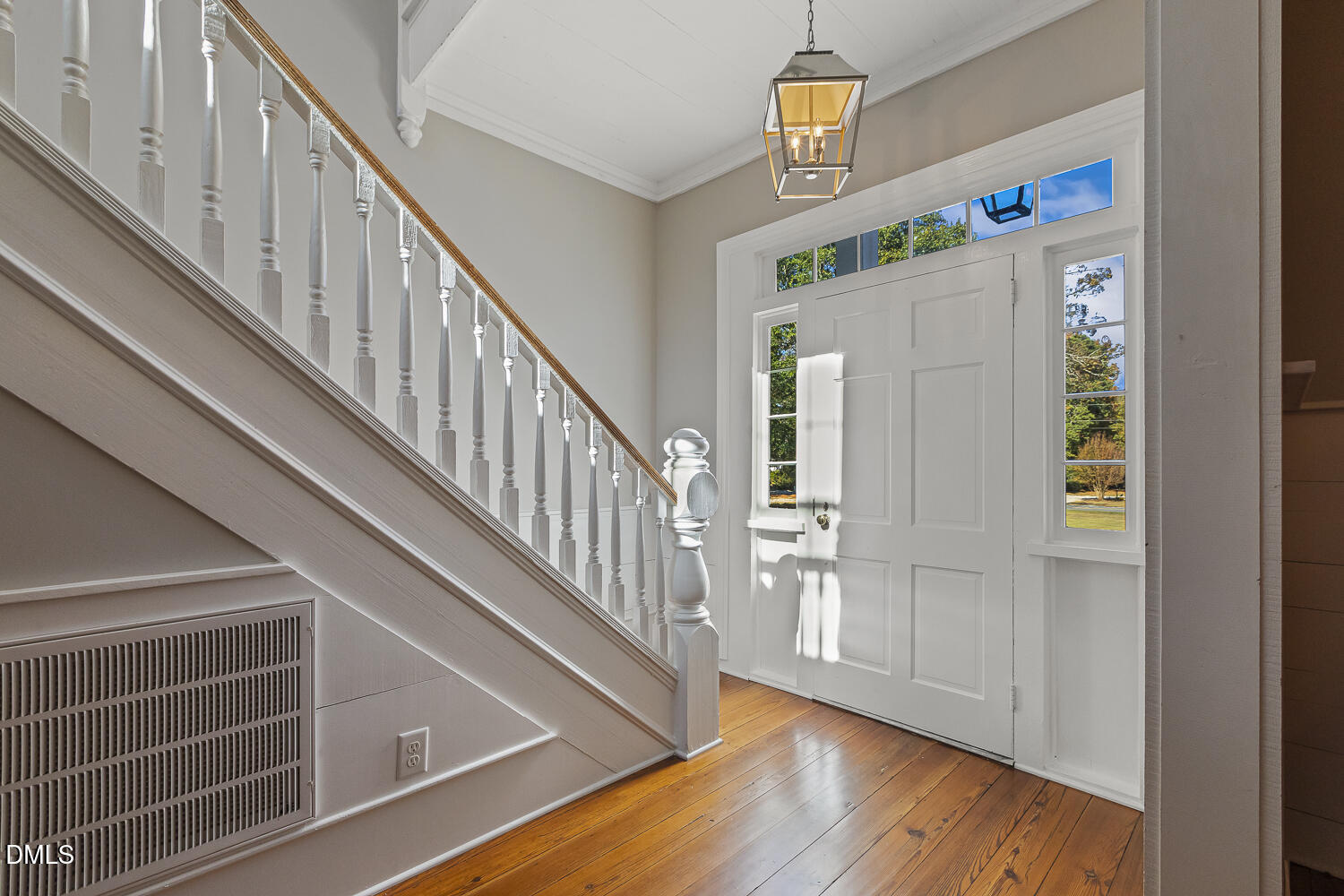 129 Kipling Road Fuquay-Varina, NC 27526 - Photo 5 of 58 a view of an entryway with wooden floor