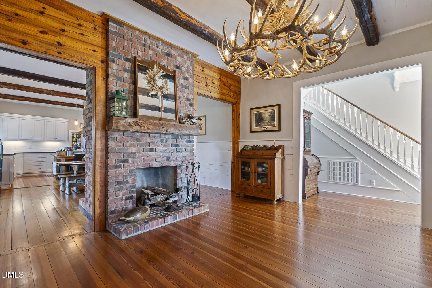 129 Kipling Road Fuquay-Varina, NC 27526 - Photo 6 of 58 a view of a livingroom with furniture and a fireplace