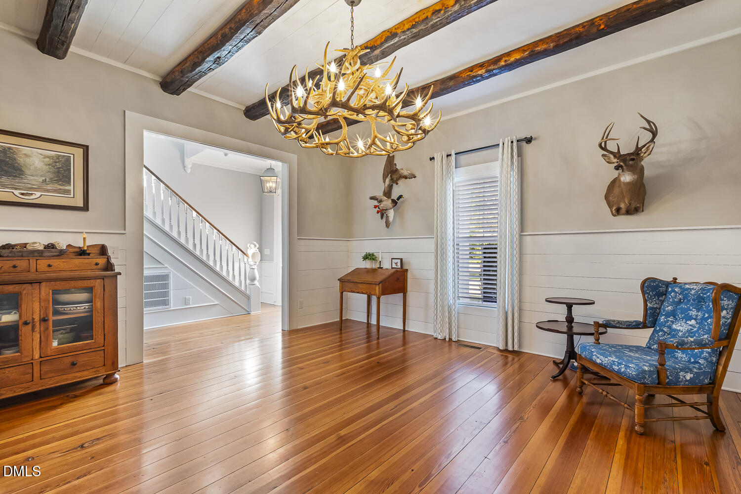 129 Kipling Road Fuquay-Varina, NC 27526 - Photo 8 of 58 a view of a livingroom with furniture and wooden floor