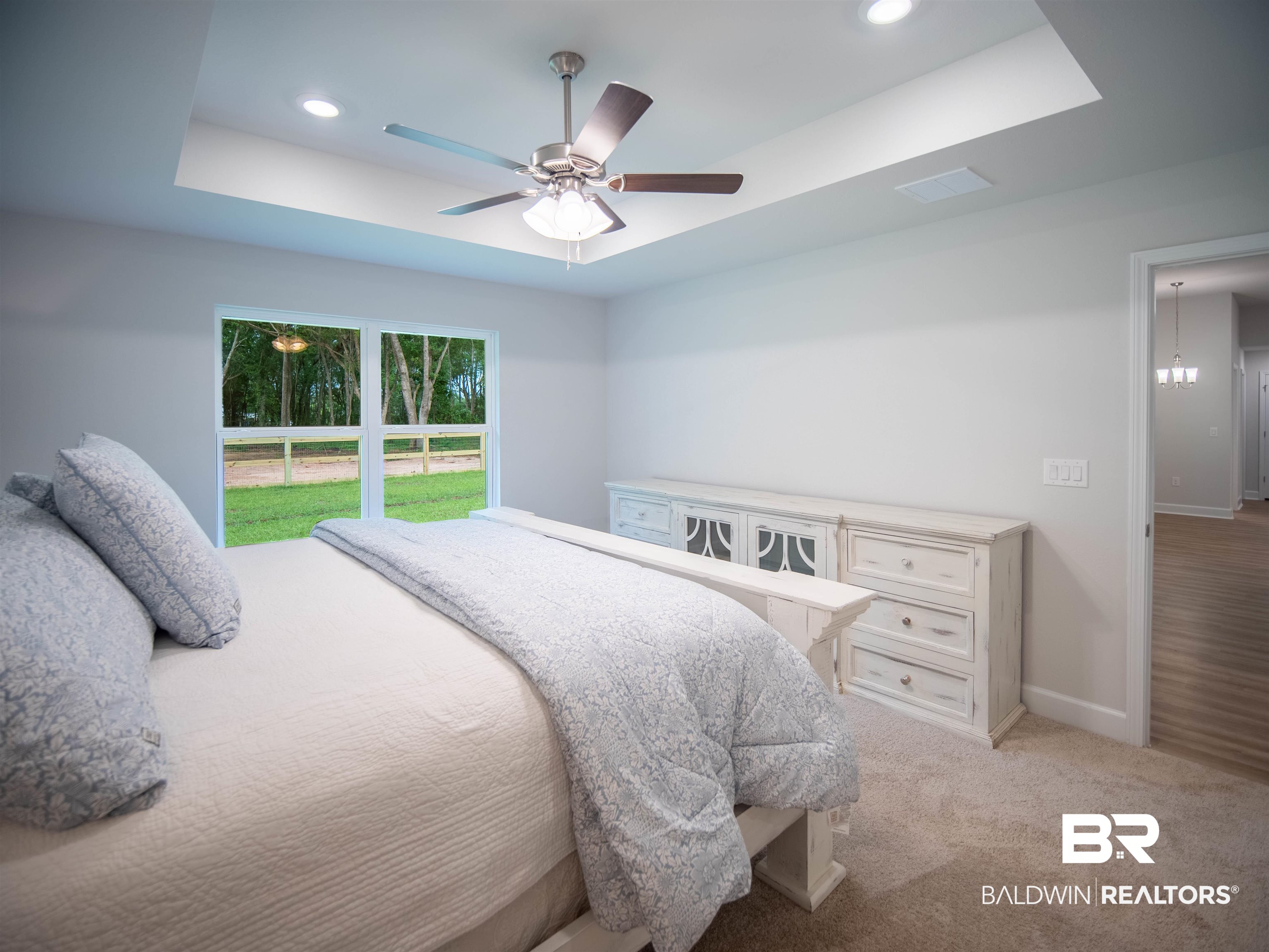 12646 Michigan Avenue Elberta, AL 36530 - Photo 16 of 47 Bedroom with a raised ceiling, recessed lighting, ceiling fan, and light colored carpet