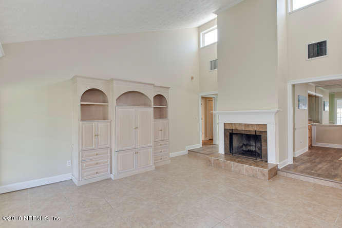39 Solana Road Ponte Vedra Beach, FL 32082 - Photo 18 of 32 an empty room with fireplace