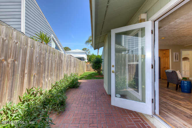 39 Solana Road Ponte Vedra Beach, FL 32082 - Photo 28 of 32 a view of a door with a backyard
