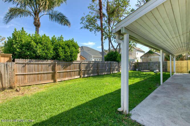 39 Solana Road Ponte Vedra Beach, FL 32082 - Photo 29 of 32 a view of backyard with green space