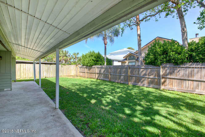 39 Solana Road Ponte Vedra Beach, FL 32082 - Photo 30 of 32 a view of backyard with green space