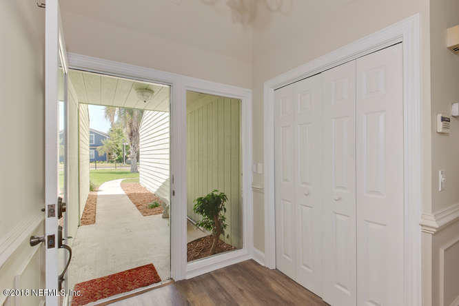 39 Solana Road Ponte Vedra Beach, FL 32082 - Photo 4 of 32 a view of entryway with wooden floor