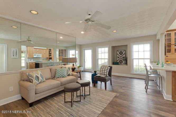 39 Solana Road Ponte Vedra Beach, FL 32082 - Photo 5 of 32 a living room with furniture and wooden floor