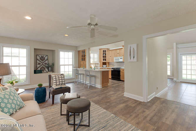 39 Solana Road Ponte Vedra Beach, FL 32082 - Photo 7 of 32 a living room with furniture and a large window