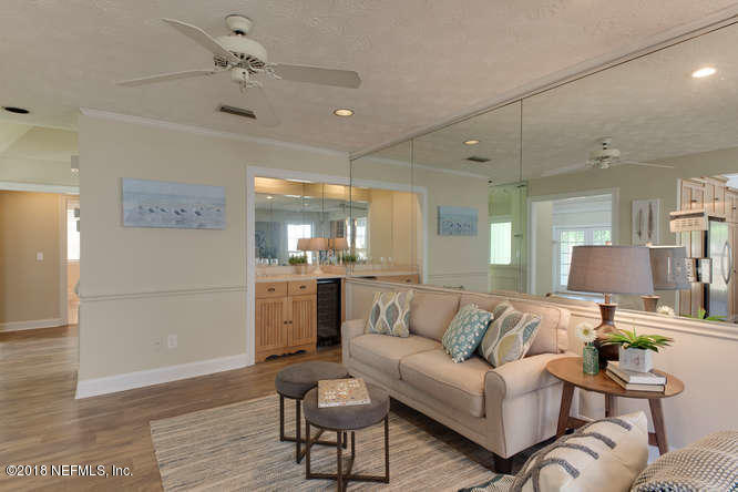 39 Solana Road Ponte Vedra Beach, FL 32082 - Photo 8 of 32 a living room with furniture and kitchen view