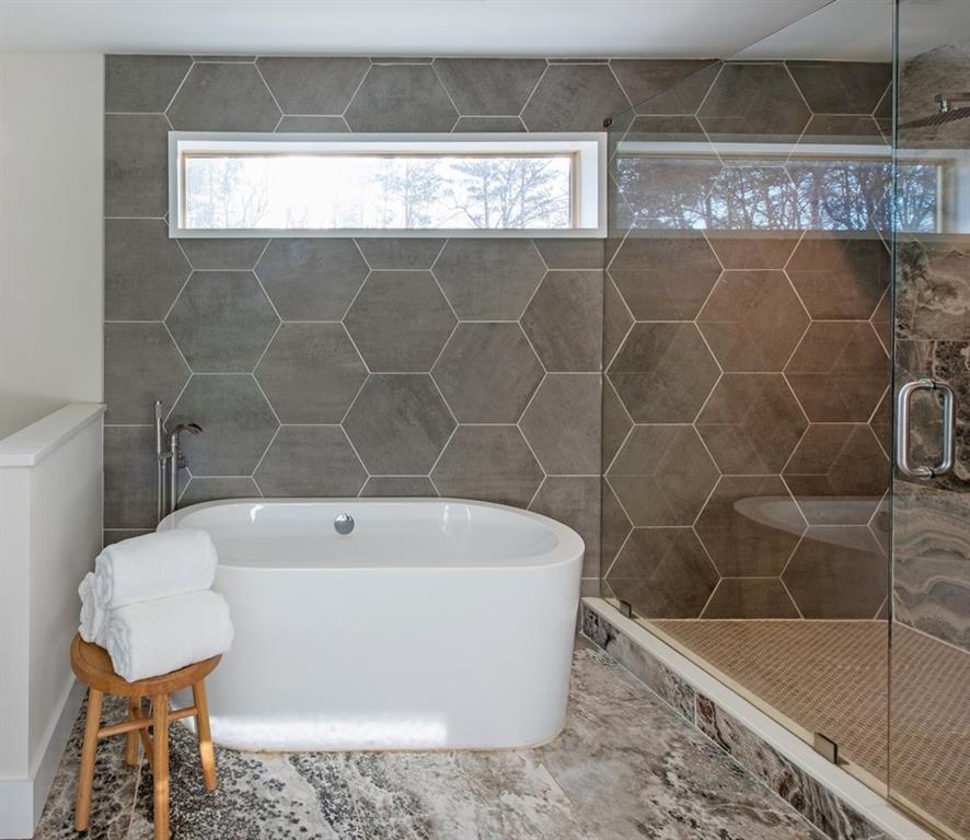 331 Eleanor Street Southeast Atlanta, GA 30317 - Photo 34 of 50 a white bath tub sitting in a bathroom