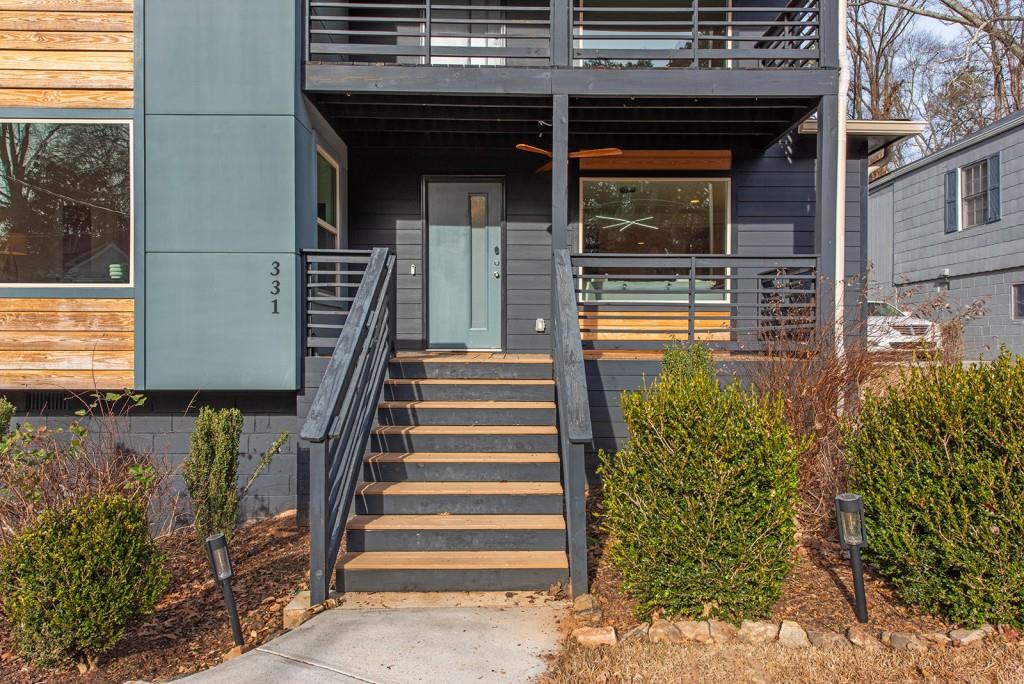 331 Eleanor Street Southeast Atlanta, GA 30317 - Photo 48 of 50 a view of a house with entryway and a wooden fence